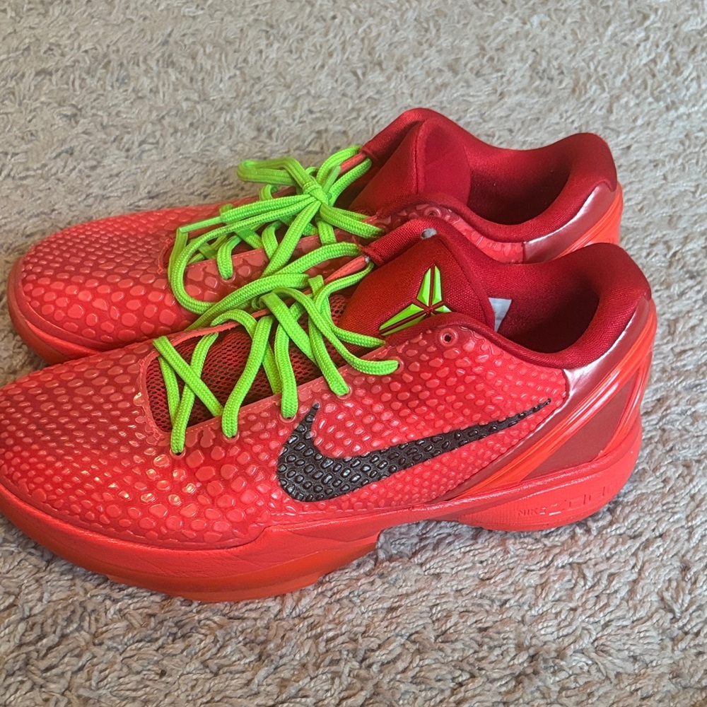 Nike Red Athletic Shoes with Green Laces